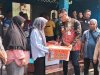 Penyerahan bantuan untuk korban bencana kebakaran  di Lumbungkerep Wonosari,